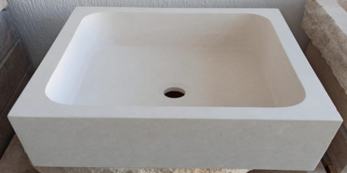 Vasque lave-mains en pierre beige clair uni